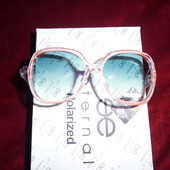 Красивые солнцезащитные очки Eternal. 100% протектор защиты. Прозрчная оправа с кораллом