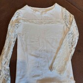 Стрейчева трикотажна блуза з гипюром