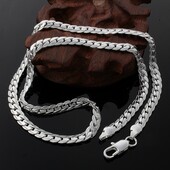 Серебряная цепочка 925 пробы. Длина 65 см, ширина 5 мм.