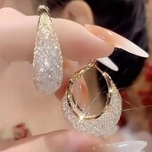 Изысканные крупные нарядные шикарные серьги-кольца !
