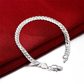 Серебряный браслет 925 пробы. Длина 18 см, ширина 5 мм.