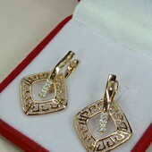 Шикарные серьги с греческим орнаментом и дорожками фианитов.Позолота 585 пробы 18К.