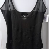 Новий комбез, з цінником дуже утягуючий, із Америки. Розмір 2 Х.