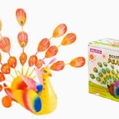 Музична іграшка "Павич" на батарейках їздить та грає.