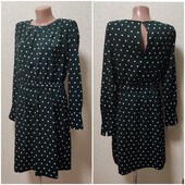 Темно-зелена сукня в горох