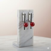 Дуже красиві срібні сережки з чорною усипкою і бурштином