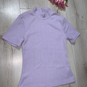 У новому стані футболка стрейчева розмір XS.