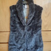 Жилетка жіноча тепла