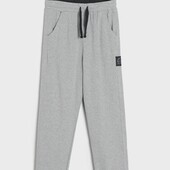 Трикотажні джогери(начос).sinsay..колір сірий.розмір 140