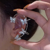 каф, кафа на ліве вушко з метеликами