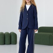 Шикарний і стильний костюм. Піджак на підкладці і широкі штани. Сині та чорні