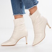 Білі шкіряні черевики