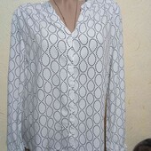 Дуже гарна віскозна сорочка м розміру,в грудях 98 см.