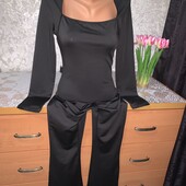 Новий стан.Стрейчевий комбінезон розмір S.