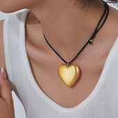 Підвіска об'ємна серце на довгому чорному шнурку, мотузці. Медзолото