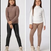 Класний,теплий гольфик молочного кольору в рубчик р. 146 - 158! Стан нового!