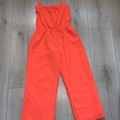 Яскравий комбінезон на 7років.