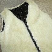Фирменный меховой жилет от H&M в отличном состоянии