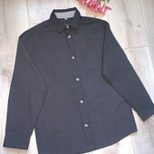 В ідеалі сорочка у сіру смужку на зріст 146-152см.