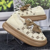 Теплі зимові тапки.