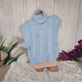 В'язана жилетка королівського розміру