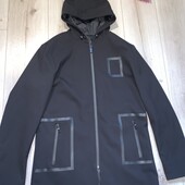У новому стані.Куртка на підкладці подовжена НОГ 54см.