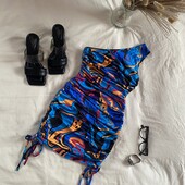 Міні-сікня зі збірками по боках на одне плече